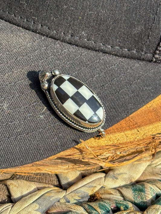 Checkered hat pin
