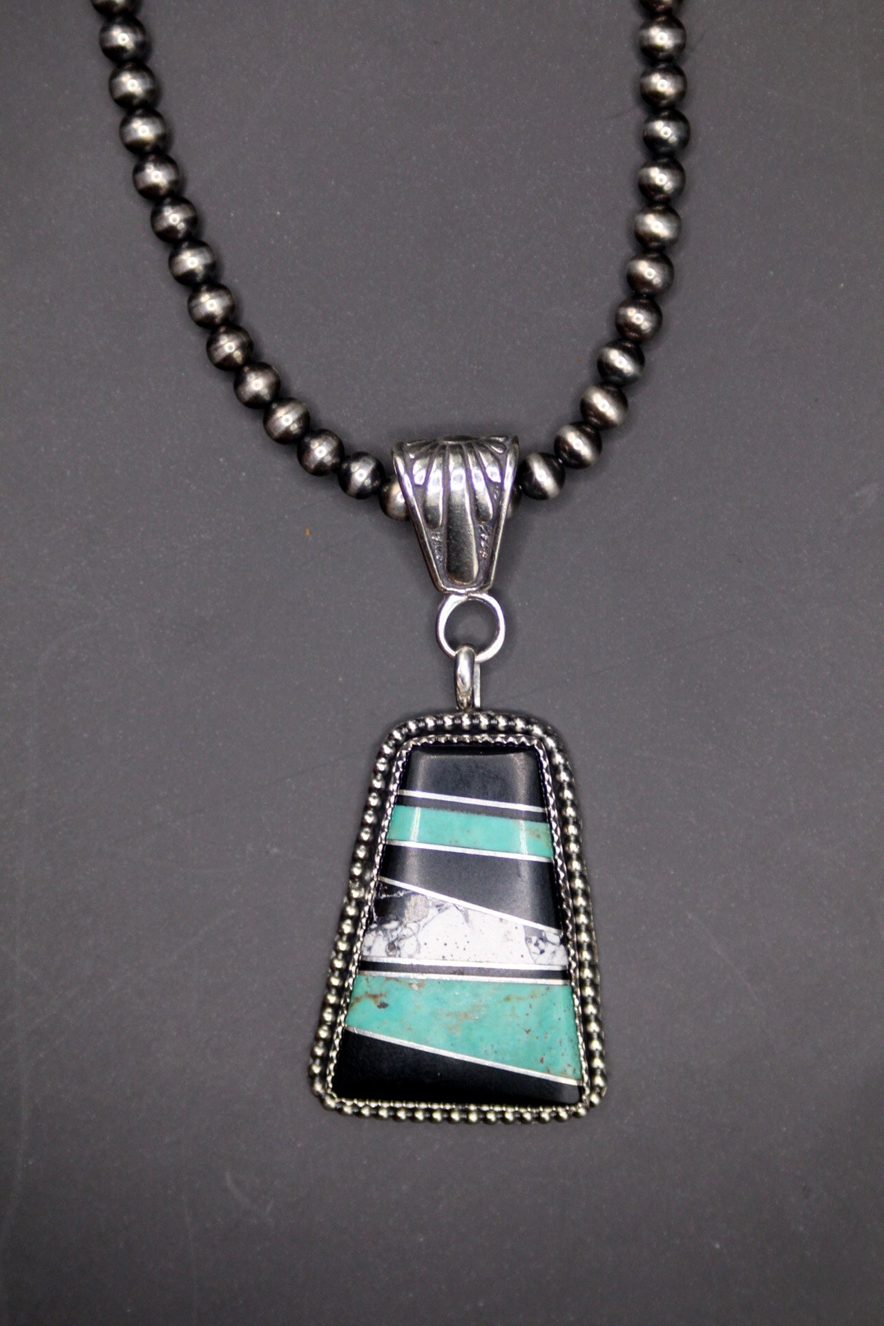 Turquoise/white buffalo/ black onyx pendant