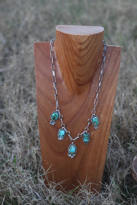 Sonoran gold floral charm necklace